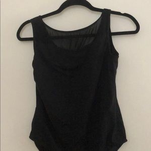 Solid blacks and mesh leotard